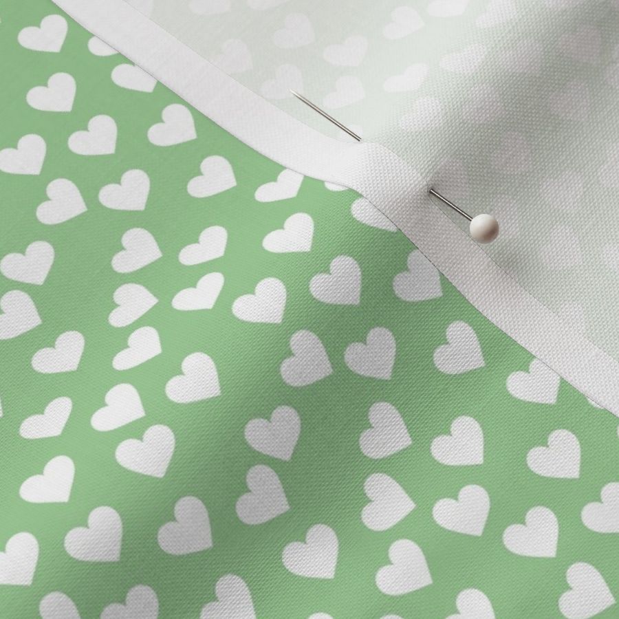 White hearts on green (mini)